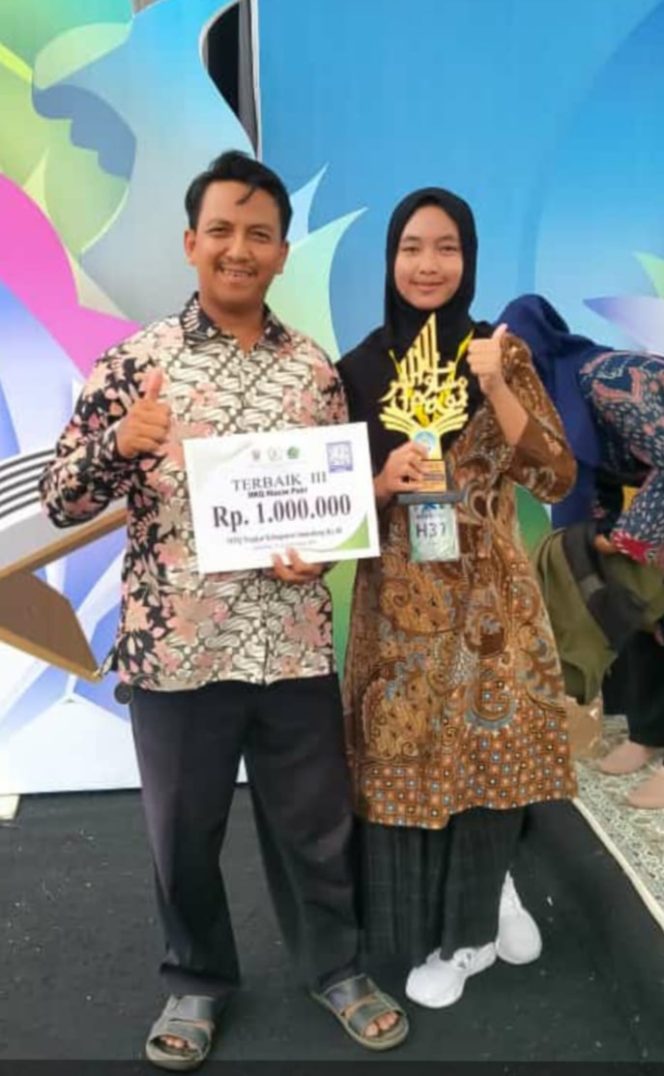 
 Neysa Balqis Azka Ramadhani Kembali Raih Prestasi, Juara III Golongan Hiasa Mushaf Putri pada MTQ di Sumedang